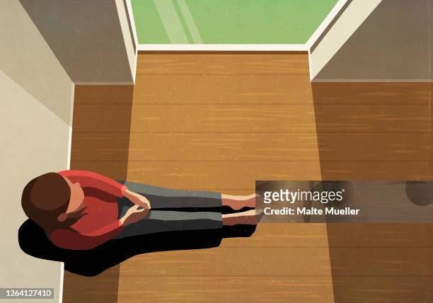 lonely woman sitting in sunny window - quarantäne stock-grafiken, -clipart, -cartoons und -symbole