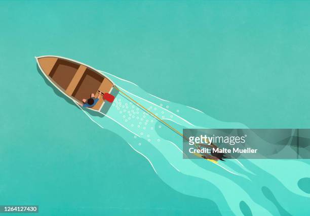 rowboat pulling water skier - holiday stock illustrations