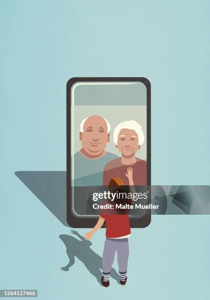 girl video chatting with grandparents on smart phone screen - grandfather stock-grafiken, -clipart, -cartoons und -symbole