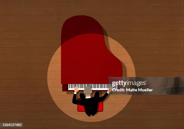 concert pianist performing at grand piano on stage under spotlight - halle gebäude stock-grafiken, -clipart, -cartoons und -symbole