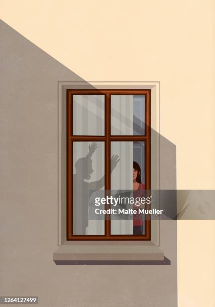 shadow of angry man gesticulating at woman in apartment window - domestic violence men stock-grafiken, -clipart, -cartoons und -symbole
