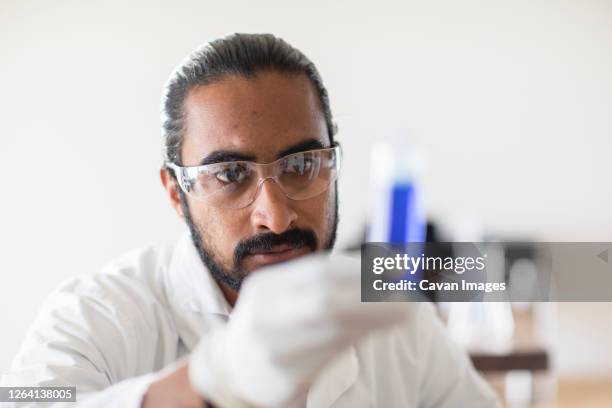 Man In Lab Young Man In Lab Coat Photos and Premium High Res Pictures - Getty Images