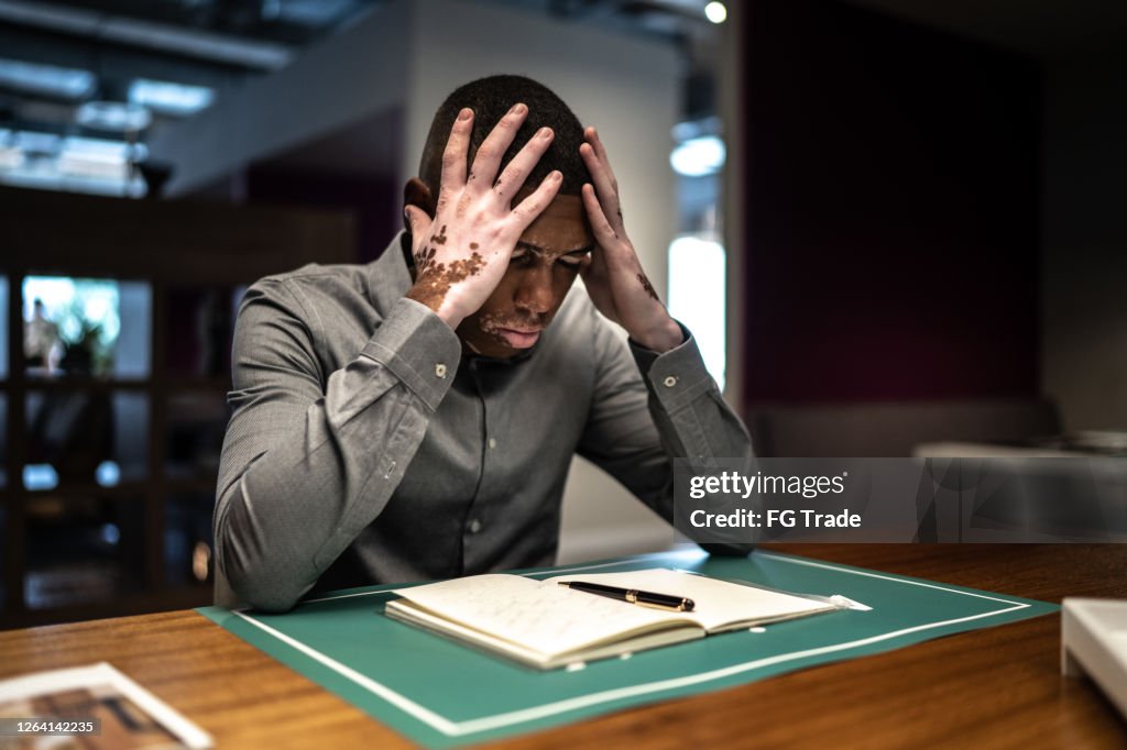 Worried and stressed student while studying or working