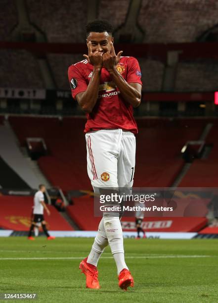 Jesse Lingard of Manchester United celebrates scoring their first goal during the UEFA Europa League round of 16 second leg match between Manchester...