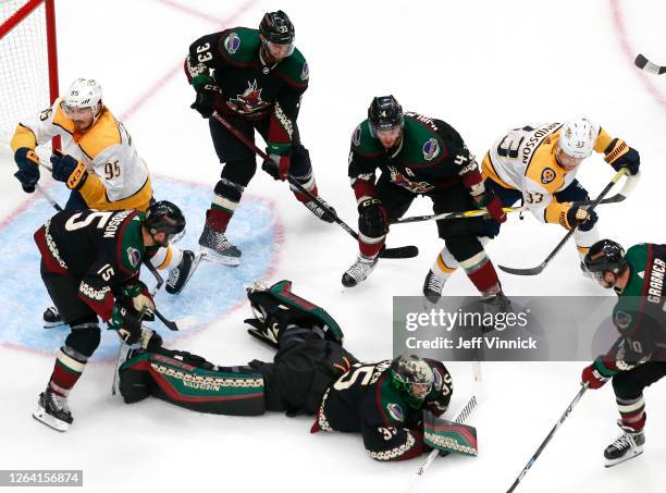 Darcy Kuemper of the Arizona Coyotes stops a shot by Viktor Arvidsson of the Nashville Predators in the third period in Game Three of the Western...