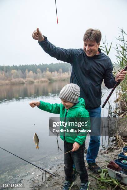 344 Man Catch Small Fish Stock Photos, High-Res Pictures, and