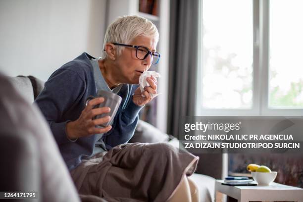 sick senior woman at home. - old cough stock pictures, royalty-free photos & images