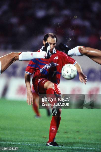 Alcindo Sartori of Kashima Antlers controls the ball under pressure of of Nagoya Grampus Eight defense during the J.League Nicos Series match between...