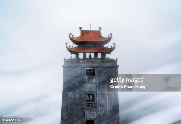 kim son bao thang pagoda on fansipan moutain peak - vietnam wall stock pictures, royalty-free photos & images