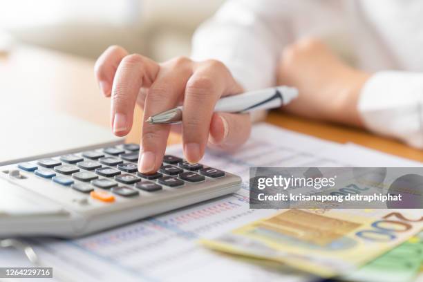 business woman accounting concept,business woman thinking account,accounting,count,business women, - different loans stockfoto's en -beelden