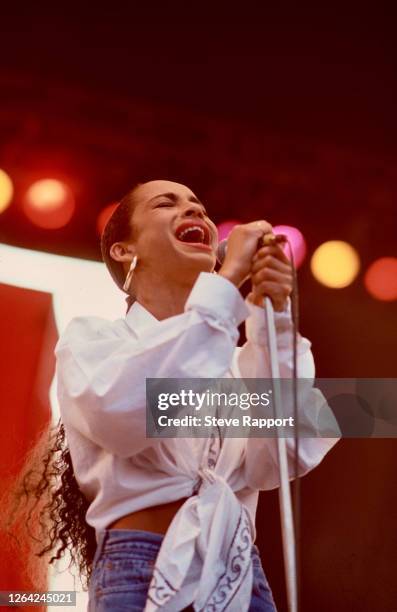 British Jazz and Soul singer Sade Adu, of the group Sade, performs during the Artists Against Apartheid Freedom Festival, Clapham Common, London,...