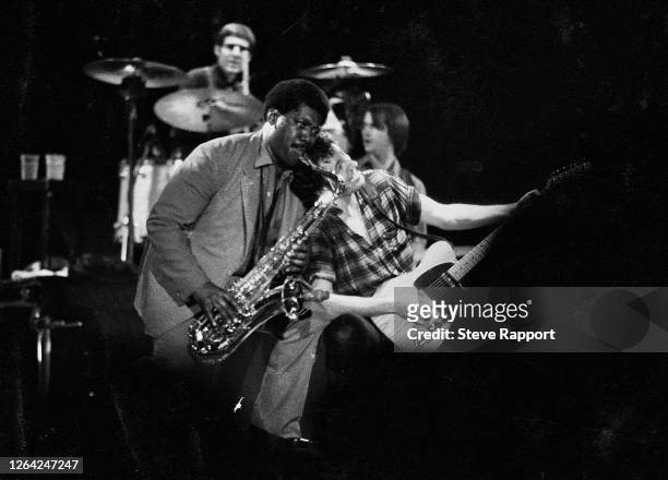 American Rock musicians Clarence Clemons and Bruce Springsteen perform onstage, during 'The River' tour, Wembley Arena, London, 6/1/1981.