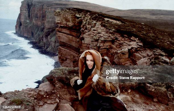 Scottish New Wave and Pop singer Annie Lennox, of the group Eurythmics, films the ‘Here Comes The Rain Again’ music video, Orkney, Shetland Islands,...