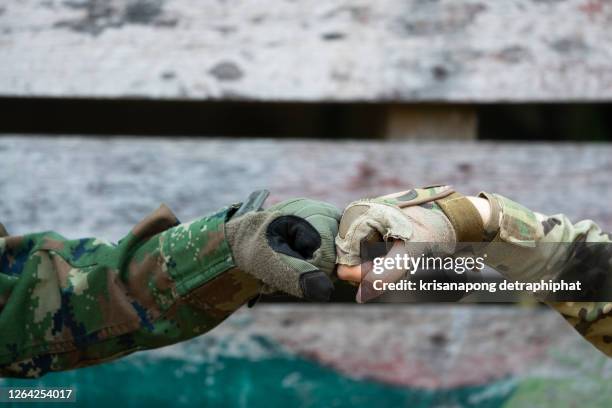 female soldier charades - infantry stock pictures, royalty-free photos & images