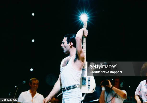 Rock musician Freddie Mercury , of the group Queen, Live Aid, Wembley Stadium, London, 7/13/1985.