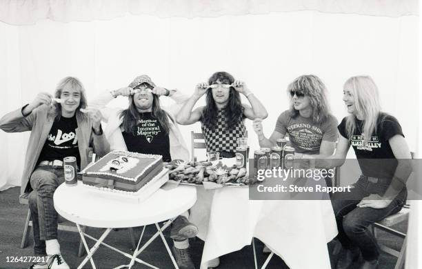 Iron Maiden backstage at the Reading Festival, Reading, 8/29/1982. Pictured are, from left, Clive Burr, Bruce Dickinson, Steve Harris, Adrian Smith,...