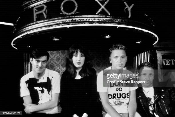 View of British New Wave and Alternative musicians Stephen Morris, Gillian Gilbert, Bernard Sumner, and Peter Hook, of the band New Order, at the...