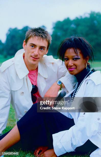 English Pop musician Paul Weller and Dee C Lee, both of the group the Style Council, Hyde Park, London, 6/26/1985.