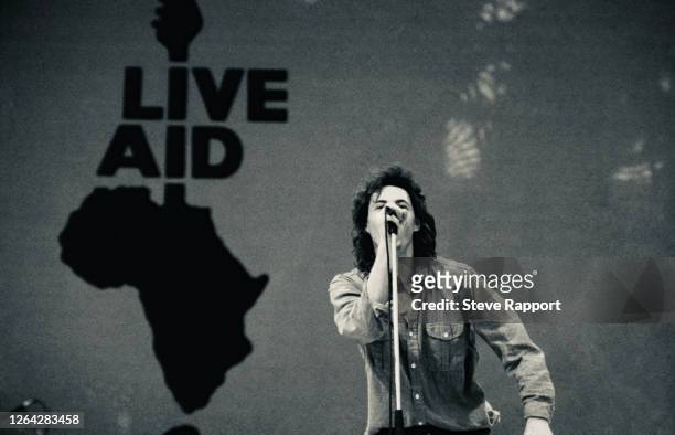 Irish Rock musician Bob Geldof, of the group the Boomtown Rats, performs onstage during the Live Aid benefit concert, Wembley Stadium, London,...