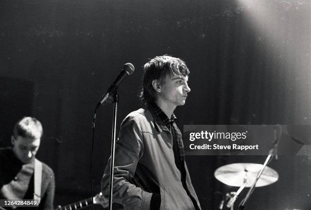 British Punk and Alternative musician Mark E Smith, of the group the Fall, The Venue, London, 12/7/1981. Visible in the background is guitarist Marc...