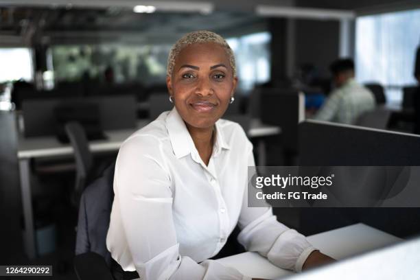 portrait of a businesswoman in the office - chief executive officer stock pictures, royalty-free photos & images