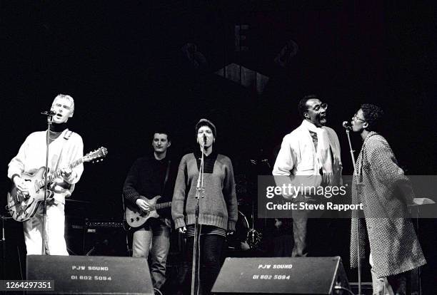 Musicians Paul Weller, Billy Bragg, Dee C Lee, and Junior Giscombe rehearse during a soundcheck, Red Wedge Tour, Manchester Apollo, Manchester,...