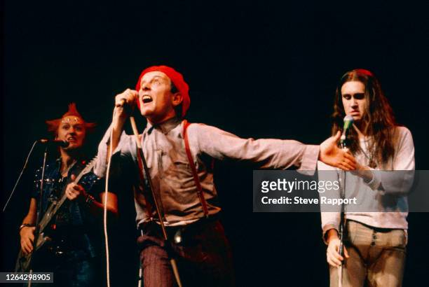 British comedians from the television show 'The Young Ones,', from left, Adrian Edmondson , Rik Mayall , and Nigel Planer during Comic Relief,...