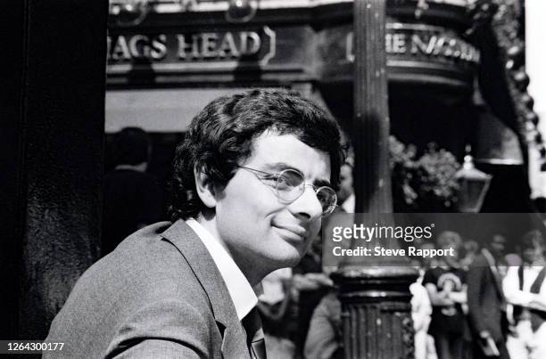 English comedian and actor Rowan Atkinson films 'Dead On Time' outside The White Lion on Floral Street , Covent Garden, London, 8/4/1981.