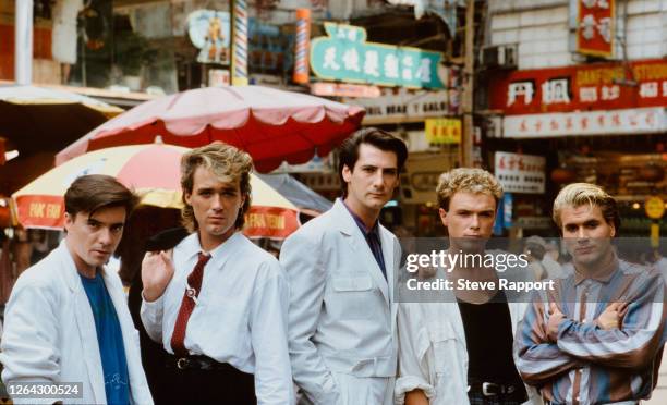 Members of the English New Wave and Synth Pop group Spandau Ballet, film the 'Highly Strung' music video, Hong Kong, 9/10/1984.