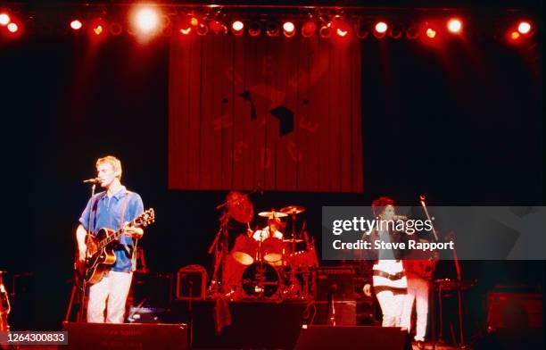 View of, from left, English musician Paul Weller, Steve White, Dee C Lee, all of the group the Style Council, Red Wedge Tour, Hammersmith Odeon,...