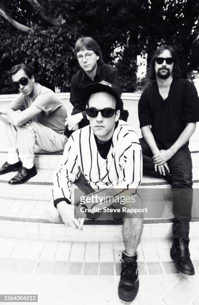 Portrait of the members of American alternative Rock group REM at the Four Seasons Hotel, Los Angeles, California, 8/27/1992. Pictured are, Michael...