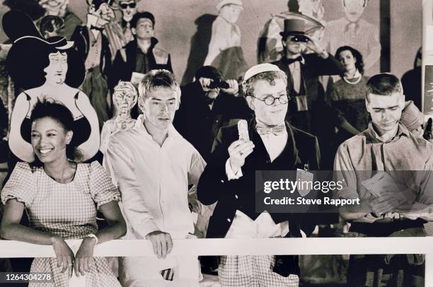 Members of English Pop and Rock group the Style Council film the music video for 'The Lodger,' 9/2/1985. Pictured are, fore from left, Dee C Lee,...