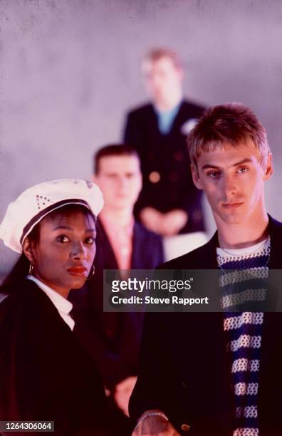English Pop and Rock musicians Dee C Lee and Paul Weller, of the group the Style Council, film the music video for 'The Lodger,' 9/2/1985. Behind...