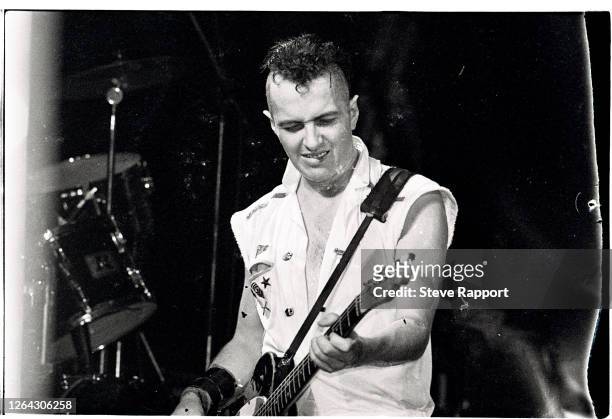 English Punk Rock musician Joe Strummer, of the group the Clash, performs at the Brixton Fair Deal , London, 7/30/1982.