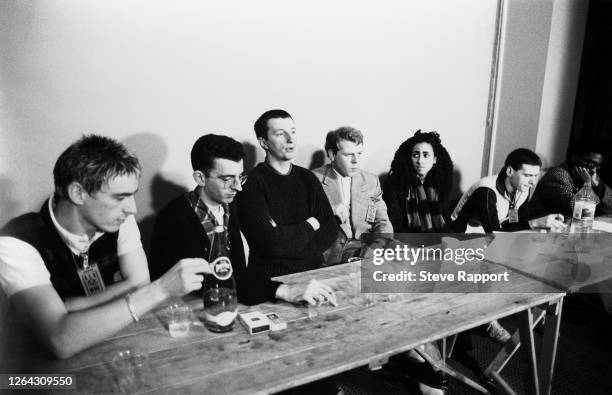 View of, from left, musicians Paul Weller, Richard Coles, Billy Bragg, Mick Talbot, Suggs, Rhoda Dakar, and Junior Giscombe during a press conference...