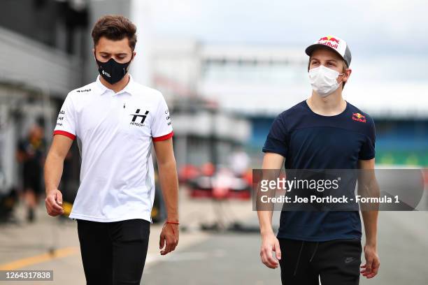 Liam Lawson of New Zealand and Hitech Grand Prix and Max Fewtrell of Great Britain and Hitech Grand Prix walk the track during previews ahead of the...
