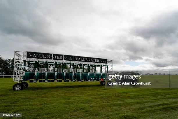 General view as the starting stalls are moved around the track at Bath Racecourse on August 06, 2020 in Bath, England. Owners are allowed to attend...