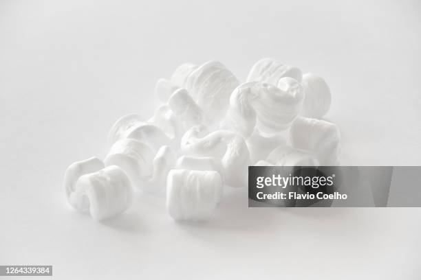 close-up of styrofoam polystyrene packing peanuts - packing foam stock pictures, royalty-free photos & images