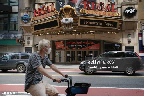 Regal Cinemas stands closed along New York City’s iconic 42nd Street on August 06, 2020 in New York City. Despite New York’s success in bringing down...