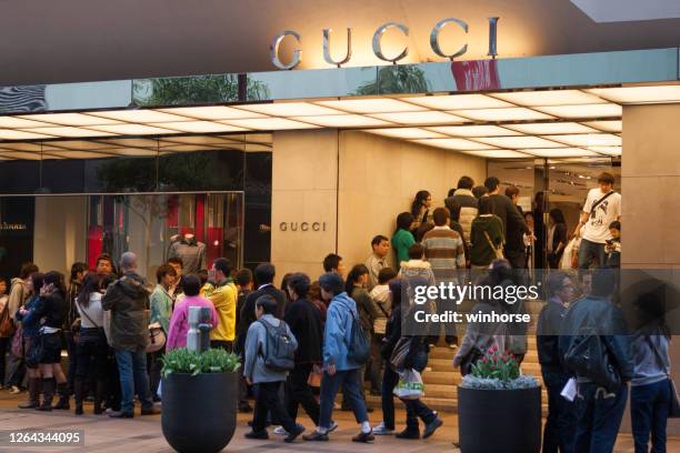 gucci store in canton road, tsim sha tsui, hong kong - gucci flagship stock pictures, royalty-free photos & images