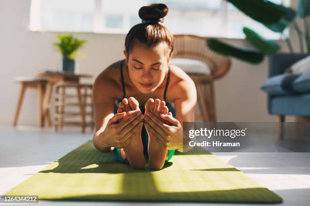 make sure you stretch enough - touching toes stock pictures, royalty-free photos & images