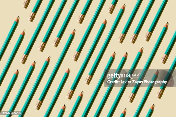 many pencils on a pastel background - writing instrument fotografías e imágenes de stock