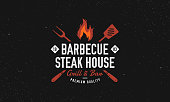 Barbecue, Steak House restaurant logo, poster. BBQ grill logo with fire flame, spatula and grill fork. Vector emblem template.