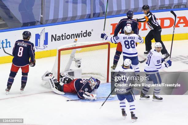 William Nylander of the Toronto Maple Leafs scores a goal past Joonas Korpisalo of the Columbus Blue Jackets during the second period in Game Three...