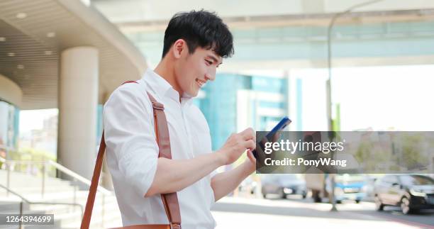 businessman use smart phone - mrt train stock pictures, royalty-free photos & images