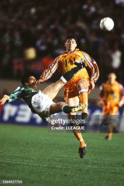 Ko Ishikawa of Verdy Kawasaki and Edu Manga of Shimizu S-Pulse compete for the ball during the J.League Nicos Series match between Shimizu S-Pulse...