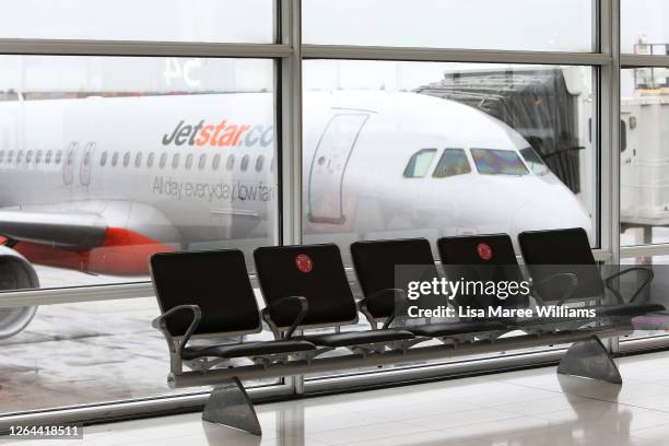 Jetstar aircraft is seen at the Sydney Domestic Airport Terminal on August 07, 2020 in Sydney, Australia. People travelling from Victoria into NSW...