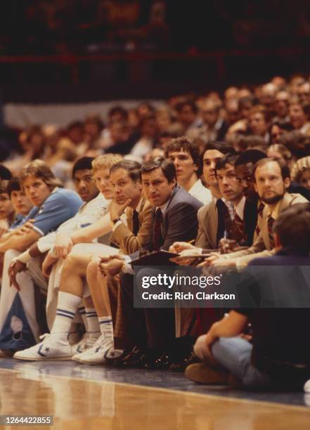 Head coach Dean Smith of the North Carolina Tar Heels looks on as they take on the Maryland Terrapins during the ACC Tournament semifinals on March...