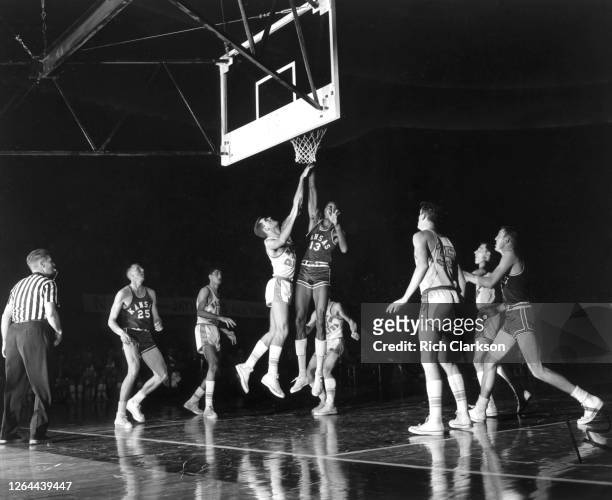 Wilt Chamberlain of the Kansas Jayhawks shoots the ball against the North Carolina Tar Heels during the NCAA Final Four National Championship game on...