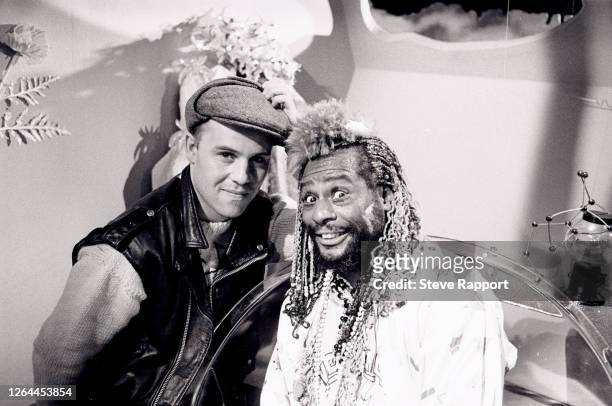 English New Wave musician Thomas Dolby and American Funk musician George Clinton film the former's 'May The Cube Be With You' music video, London,...